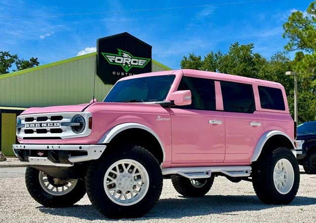 image of a custom Bronco in a baby pink color