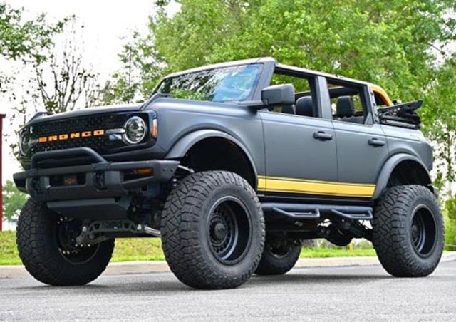 image of a custom Bronco in black with yellow accents