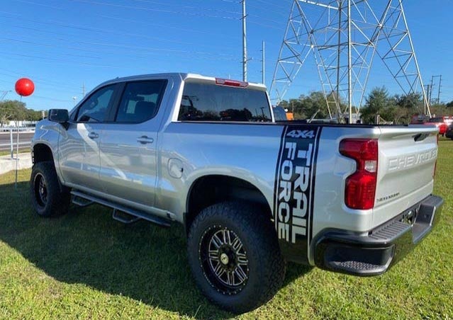 image of a custom trail force truck in silver
