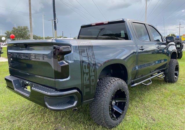 image of a custom trail force truck in dark gray