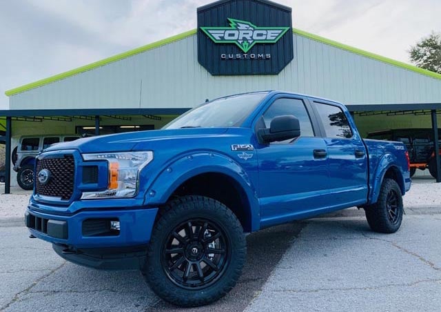 image of a blue custom truck