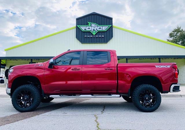 image of a custom red truck